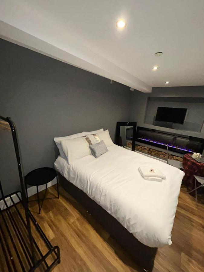 Cosy Double Bed With Fire Place
